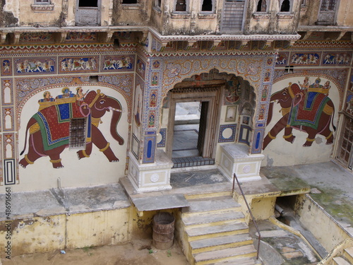Mandawa, Rajasthan, India, August 11, 2011: Elephants on the walls of an ancient palace or haveli in Mandawa, Rajasthan, India photo