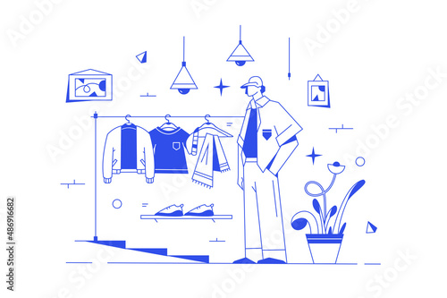Guy fitting clothes in dressing room