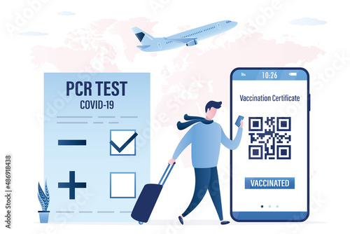 Male tourist with negative pcr test and Covid-19 vaccination certificate on mobile phone. New rules for trips and travel. Traveler with luggage. Coronavirus pandemic prevention.