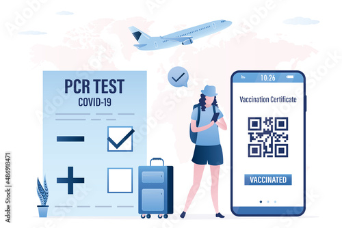 Female tourist with negative pcr test and Covid-19 vaccination certificate on mobile phone. New rules for trips and travels. Woman traveler with luggage. Coronavirus prevention.
