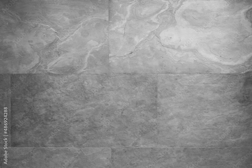 Naklejka premium Loft-style plaster walls, gray, white, empty space used as wallpaper. Popular in home design or interior design. with copy spaces.
