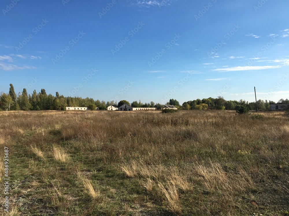 landscape with houses trees and clouds landscape with houses trees and clouds