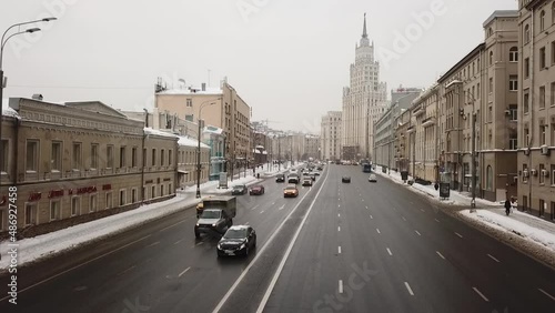 High-rise building at the Red Gate, view of cars passing by
