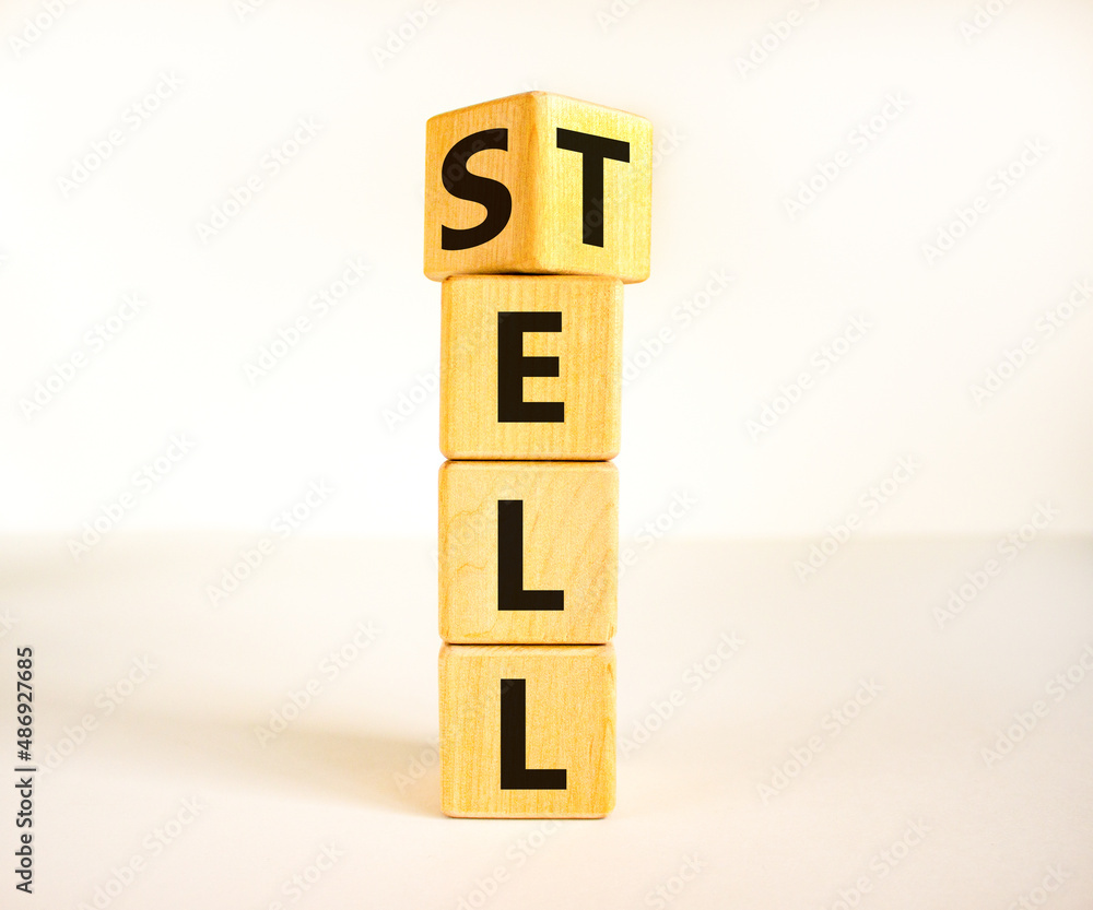 Sell or tell symbol. Turned wooden cubes and changed the concept word Tell to Sell. Beautiful white table white background, copy space. Business and storytelling storyselling sell or tell concept. Sell or tell symbol. Turned wooden cubes and changed the concept word Tell to Sell. Beautiful white table white background, copy space. Business and storytelling storyselling sell or tell concept.