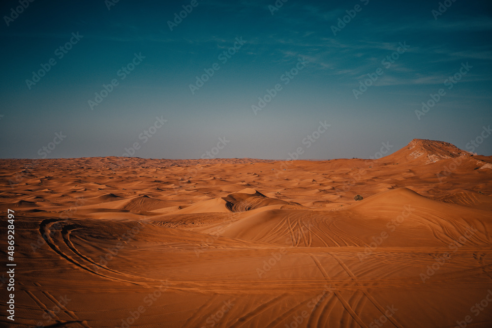 Sundown in desert. Red sand desert background. Sundown in desert. Red sand desert background.