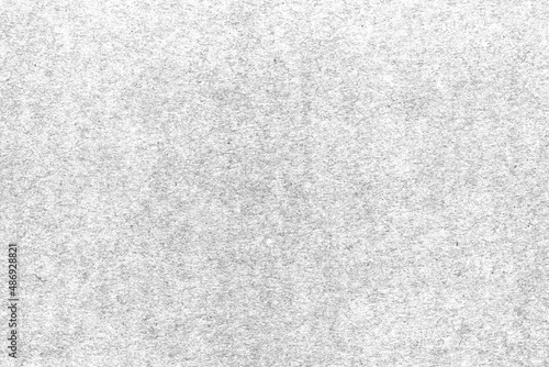 Paper texture with small spots and scratches.