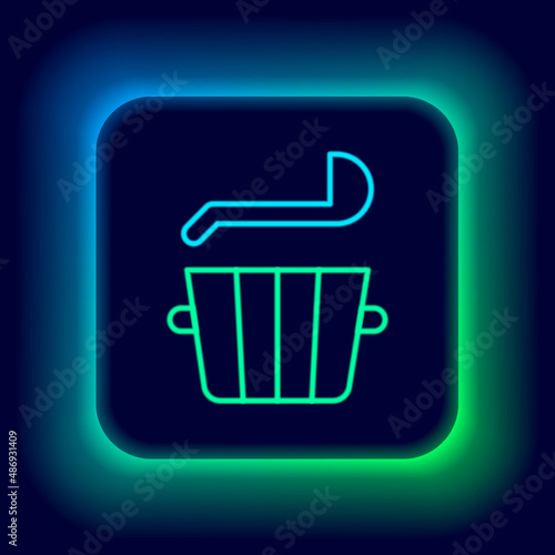 Glowing neon line Sauna bucket and ladle icon isolated on black background. Colorful outline concept. Vector