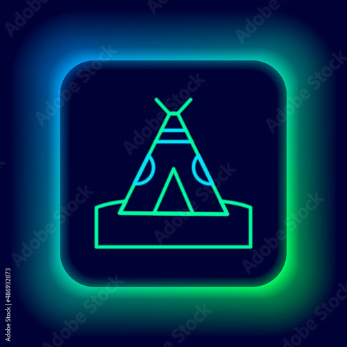 Glowing neon line Traditional indian teepee or wigwam icon isolated on black background. Indian tent. Colorful outline concept. Vector