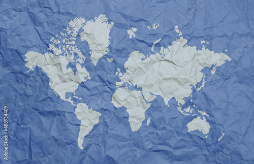 White World Map on blue crumpled paper background