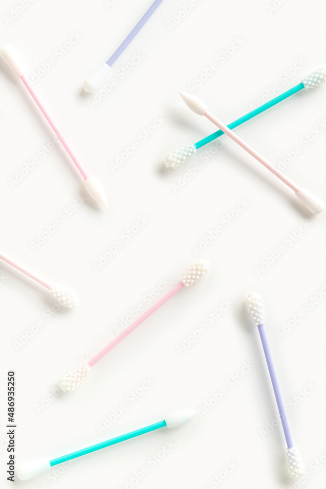 Flat lay top view reusable silicone swab buds on white background Flat lay top view reusable silicone swab buds on white background