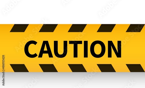 Caution tape. Yellow ribbon. Danger warning barrier
