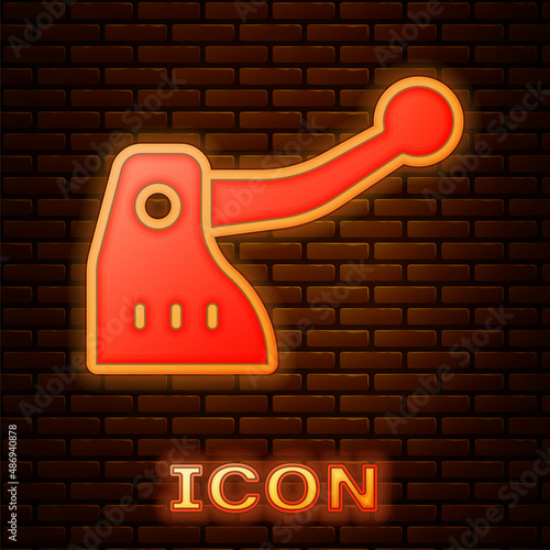 Glowing neon Bicycle brake icon isolated on brick wall background. Vector