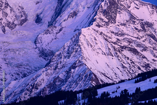 Aiguille de Bionnassay rocks at night in Europe, France, Rhone Alpes, Savoie, Alps, winter. photo