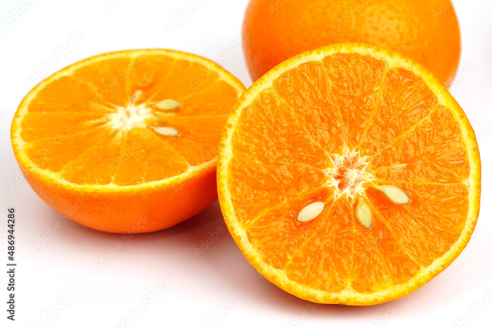 Ripe orange fruit. Orange full macro shoot fruit healthy food ingredient. Organic fresh orange isolated on white. Ripe orange fruit. Orange full macro shoot fruit healthy food ingredient. Organic fresh orange isolated on white.