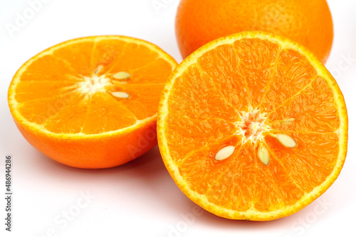 Ripe orange fruit. Orange full macro shoot fruit healthy food ingredient. Organic fresh orange isolated on white. 