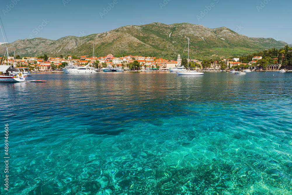 Fototapeta premium Beautiful view of Cavtat town with yachts and boats on Adriatic sea, Dalmatia, Croatia. Summer vacation concept