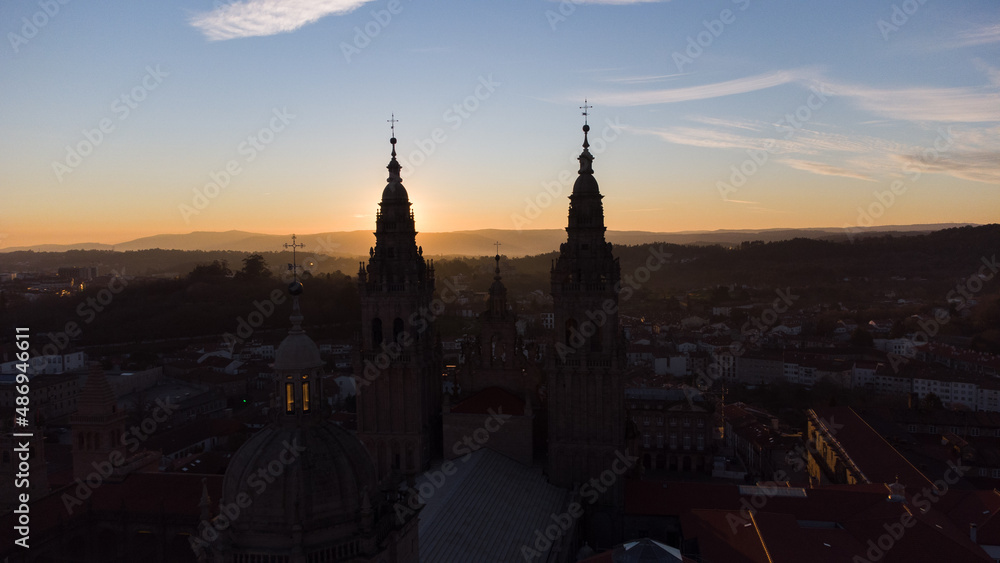 silhouette of the towers of the cathedral of Santiago de Compostela at sunset

