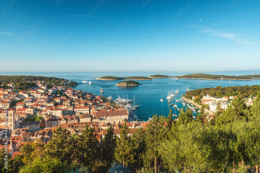 Aerial view of old town of Hvar on island Hvar, Dalmatia, Croatia. Harbor of old city with yachts and boats
