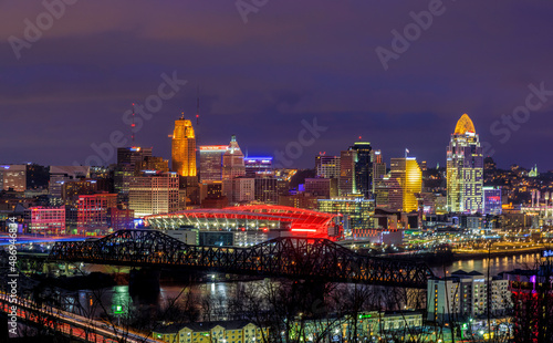 Cincinnati, Ohio USA - February 12, 2022: Panoramic View of the Cincinnati Skyline Lit Up in Orange in Honor of the Cincinnati Bengals NFL team having made it to the Superbowl