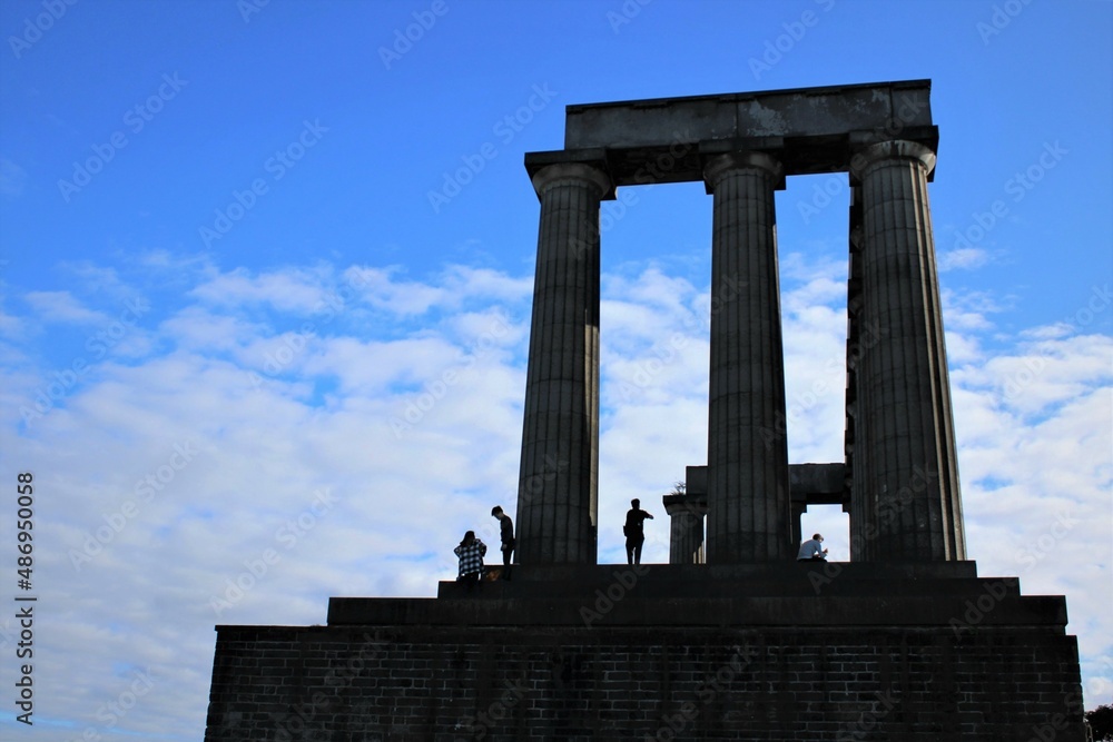 Visitors in The National Monument of Scotland, on Calton Hill in Edinburgh. 