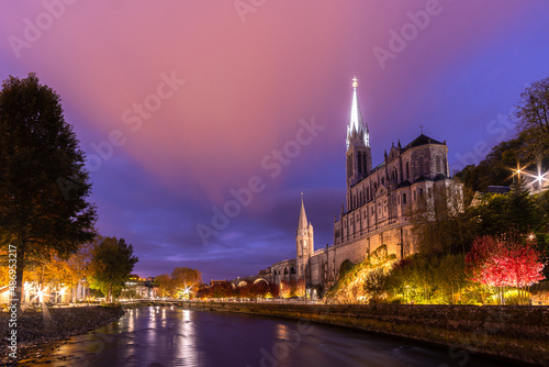 LOURDES, FRANCE - OCTOBER 10 2021: Notre Dame du Rosaire de Lourdes at night photo