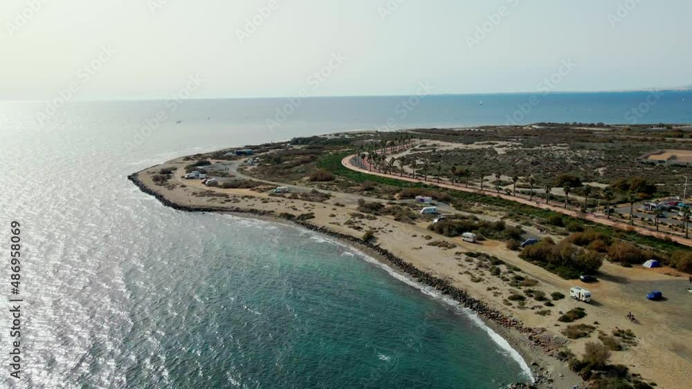 Flyover of Playa del Bobar beach and the mountains in the distance, 4K. Spain, Almeria Flyover of Playa del Bobar beach and the mountains in the distance, 4K. Spain, Almeria