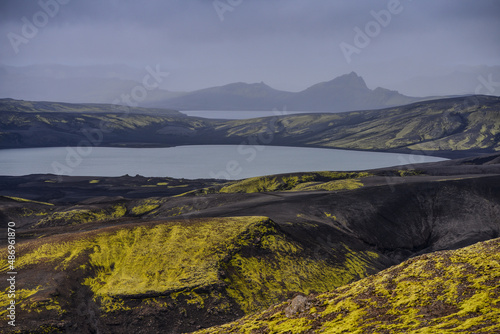 A moody view of the dramatic highlands from the top of Laki volcano, Lakagígar crater row, Iceland photo