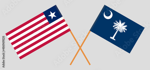 Crossed flags of Liberia and The State of South Carolina. Official colors. Correct proportion