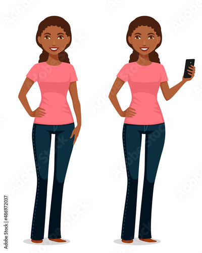 beautiful black woman in jeans, using a cell phone