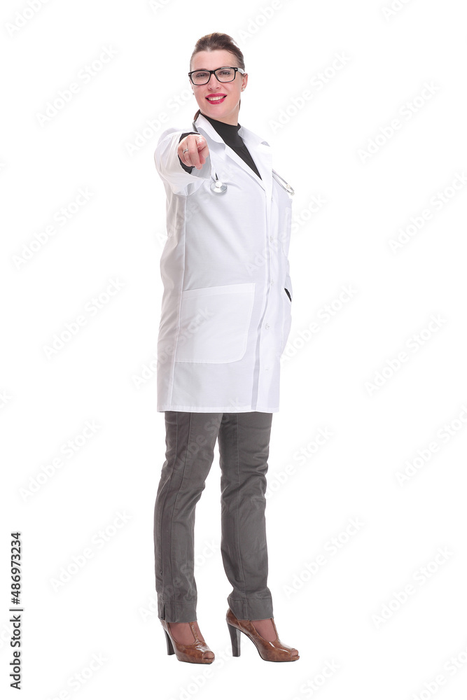 Happy smiling female doctor pointing at the camera against white background Happy smiling female doctor pointing at the camera against white background