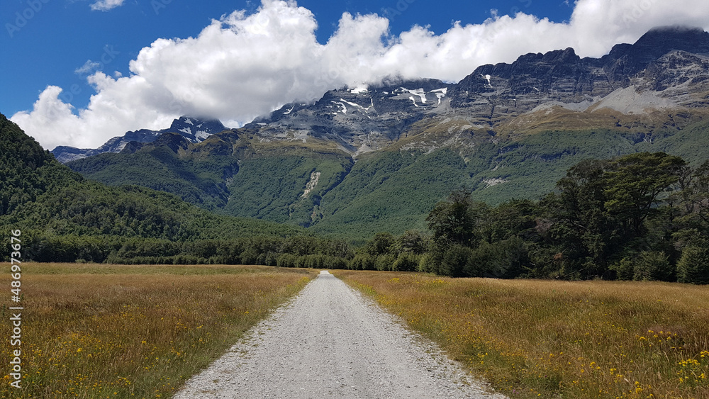 Gravel road through mountain valley and LOTR Isengard viewpoint, Paradise, New Zealand
