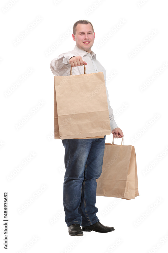 Picture of handsome smiling man in suit with shopping bags Picture of handsome smiling man in suit with shopping bags