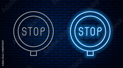 Glowing neon line Stop sign icon isolated on brick wall background. Traffic regulatory warning stop symbol. Vector
