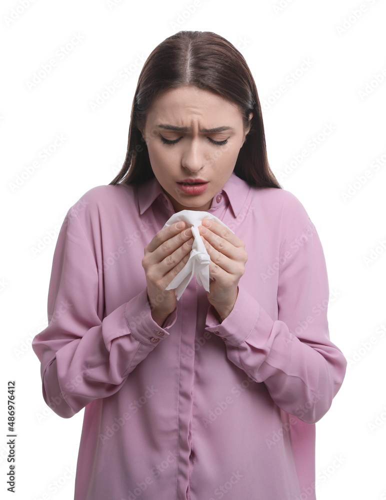 Sick woman sneezing on white background. Cold symptoms Sick woman sneezing on white background. Cold symptoms