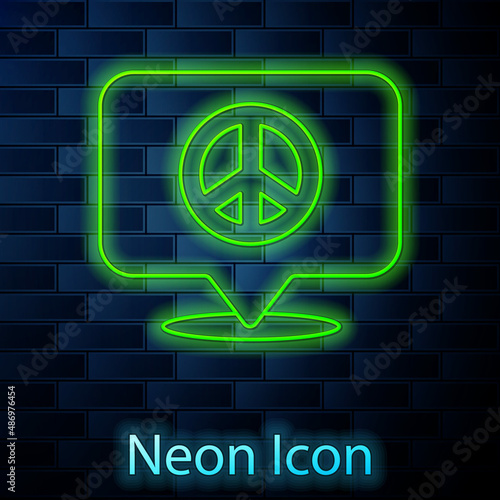 Glowing neon line Location peace icon isolated on brick wall background. Hippie symbol of peace. Vector