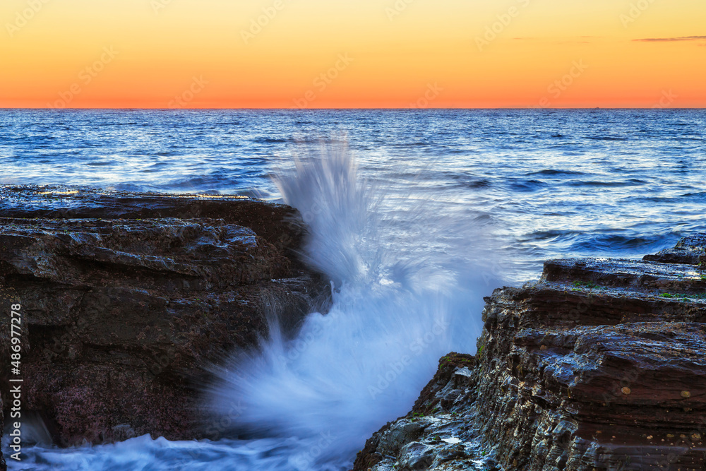 Fototapeta premium Sea Narrab red trench splash close
