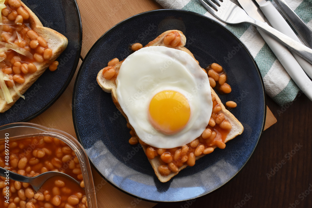 Egg and beans on toast. English breakfast style. Food from above