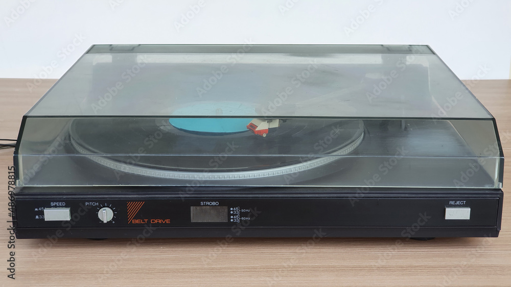 Fototapeta premium Turntable on the table. Music on vinyl record.