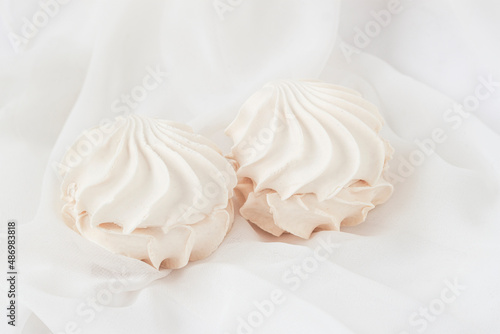 Couple of meringue marshmallows, sweet homemade zephyr