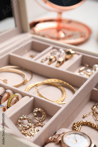 Принти на полотні Jewelry box with stylish golden bijouterie, closeup view