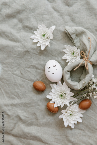 Easter eggs on a linen background. Easter background. Copy space. Easter eggs flat lay on rustic table. Easter concepts