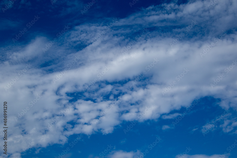 Blue sky and white cloud formations image for background use Blue sky and white cloud formations image for background use