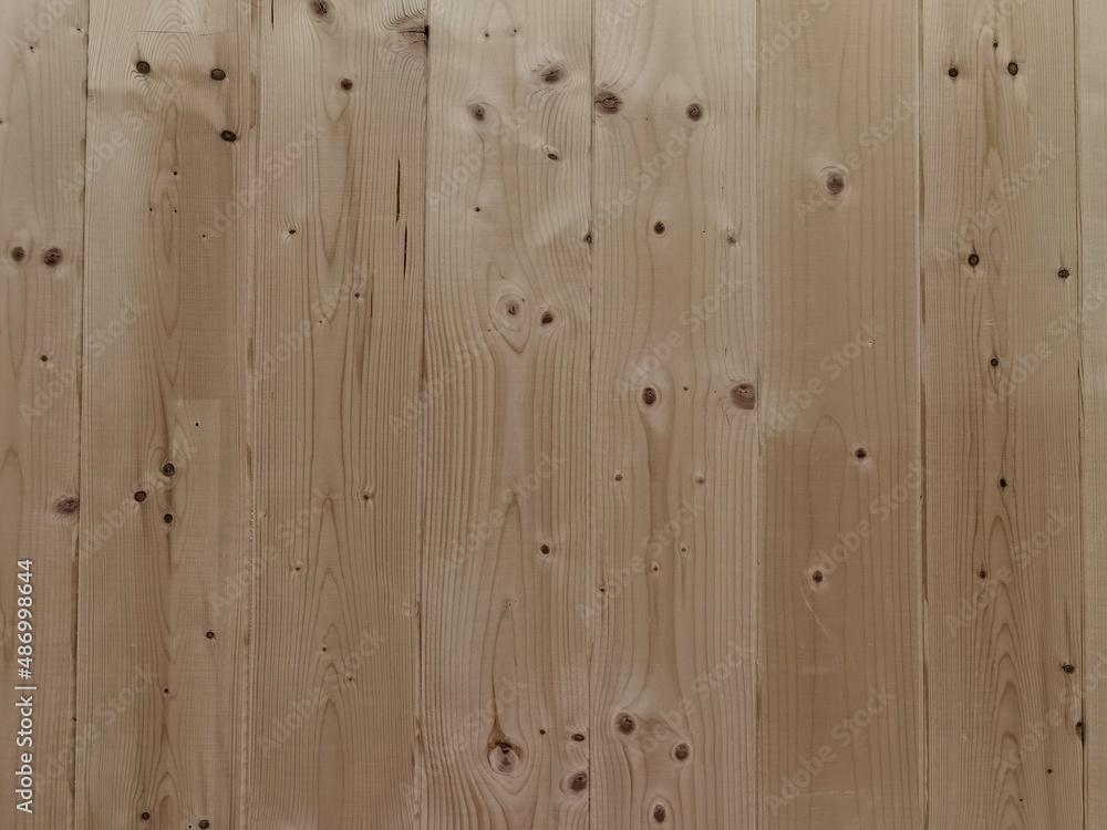 Naklejka premium wood planks liight brown with knots for background