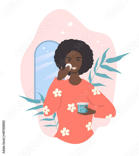 vector hand drawn illustration in flat style on the theme of beauty routine. young black woman takes care of her face skin.