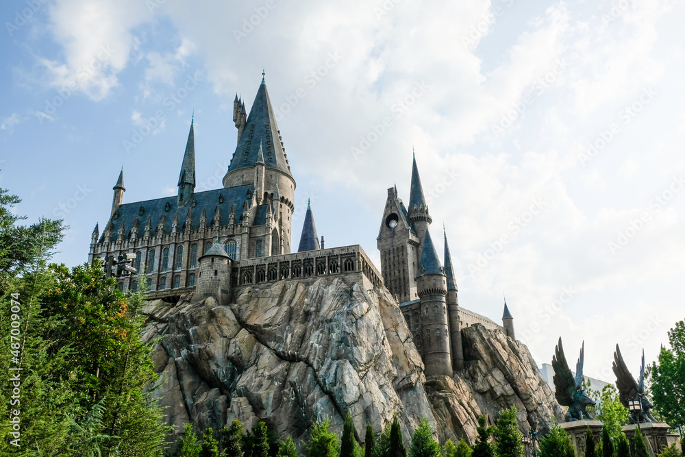 Naklejka premium Orlando, USA – May 30, 2017: The Hogwarts Castle at The Wizarding World Of Harry Potter in Adventure Island of Universal Studios Orlando. Universal Studios Orlando is a theme park in Orlando, Florida,