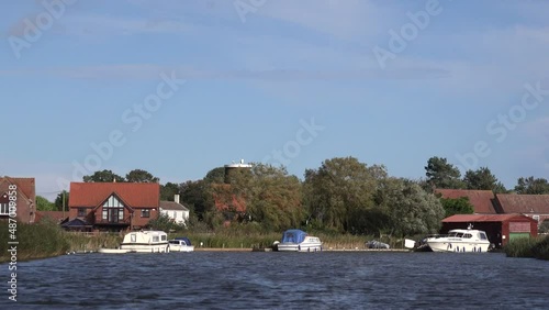 Norfolk East of England with windmills is a favourite boating holiday destination for people UK 4K photo