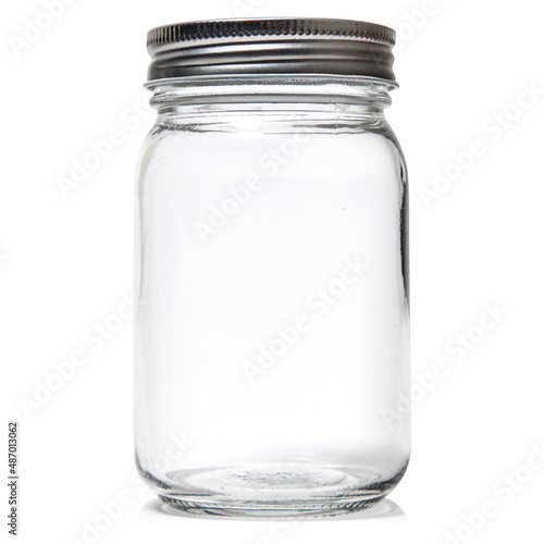 Glass mason jar on white background photo