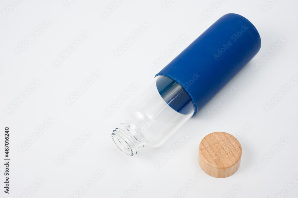 Stylish glass water bottle with wooden lid. For fitness and travel. Stylish glass water bottle with wooden lid. For fitness and travel.