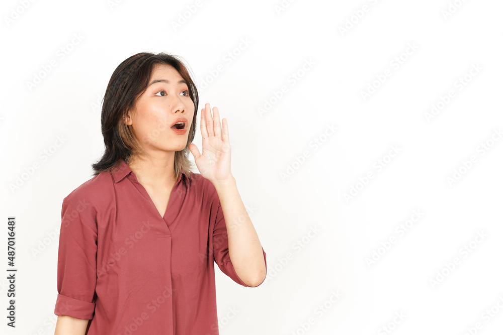 Shouting out loud with hands over mouth Of Beautiful Asian Woman Isolated On White Background Shouting out loud with hands over mouth Of Beautiful Asian Woman Isolated On White Background