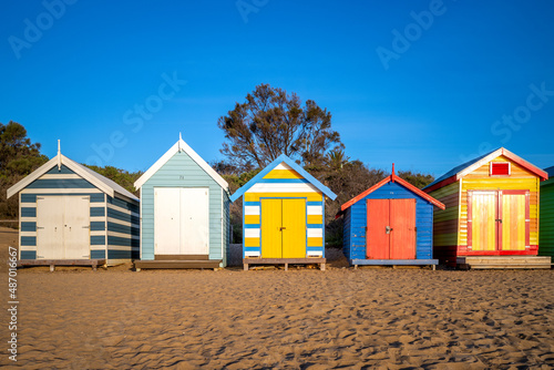 December 27, 2018: Brighton Bathing Boxes at Brighton Beach in Melbourne, Australia. These boxes were built more than 100 years ago  to Victorian notions of morality when it came to seaside bathing. © Richie Chan